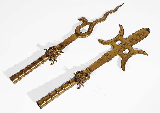 Appraisal: Two Oriental staff topsbrass plated each with a dragon's head