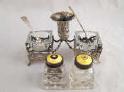 Appraisal: A two piece silver grade cruet stand with central posy