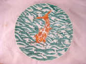 Appraisal: A Chinese ceramic charger with a goldfish amid foam and