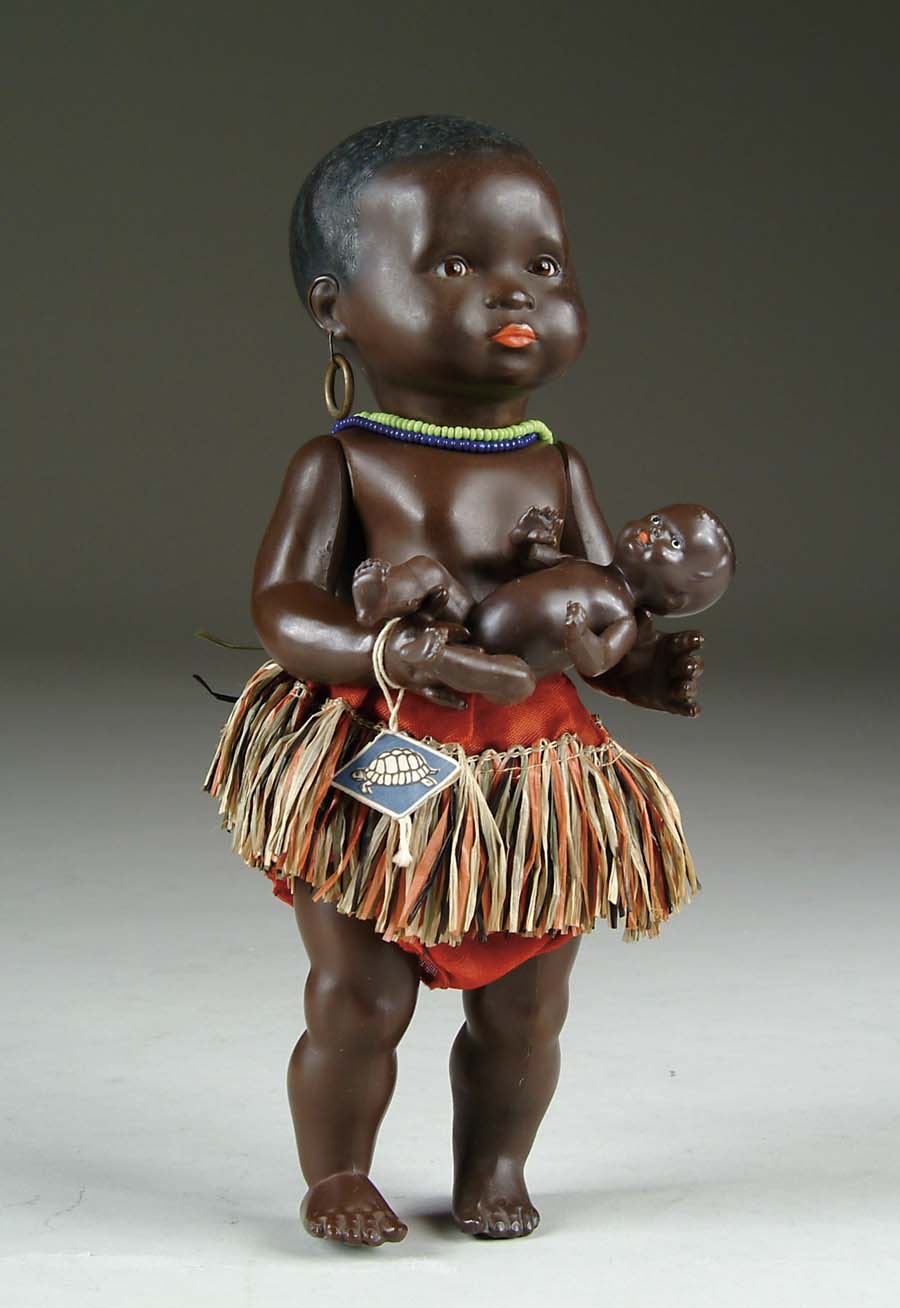 Appraisal: LOT OF TWO BLACK CELLULOID BABIES doll with inset glass