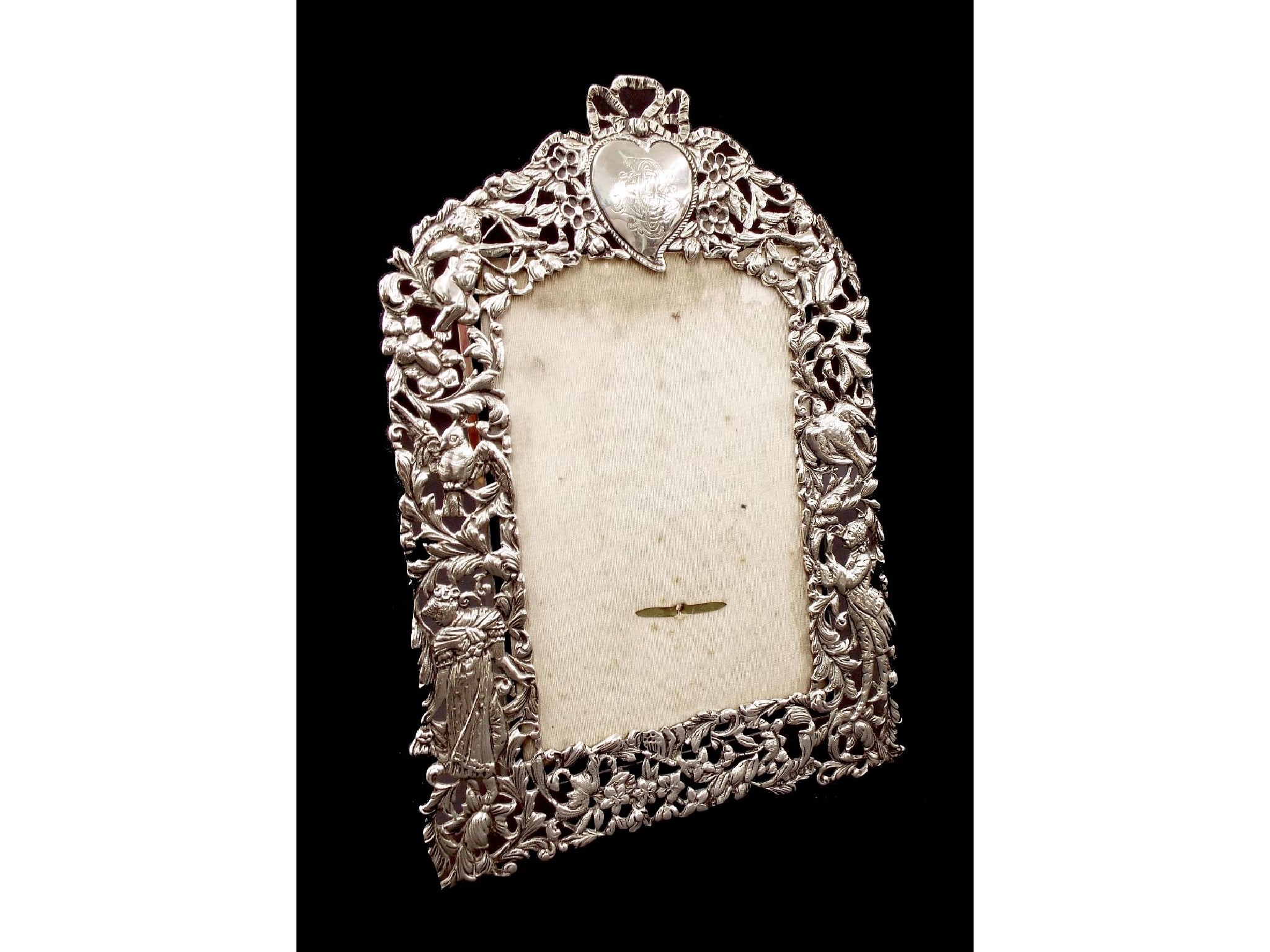 Appraisal: Late Victorian pierced silver easel picture frame decorated with figures