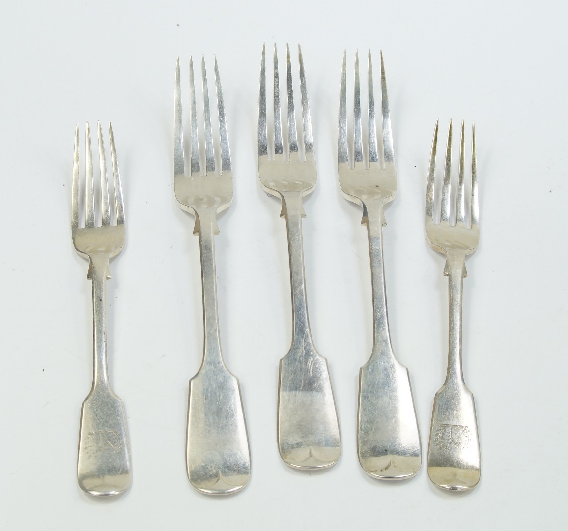 Appraisal: A set of three Victorian silver table forks decorated in