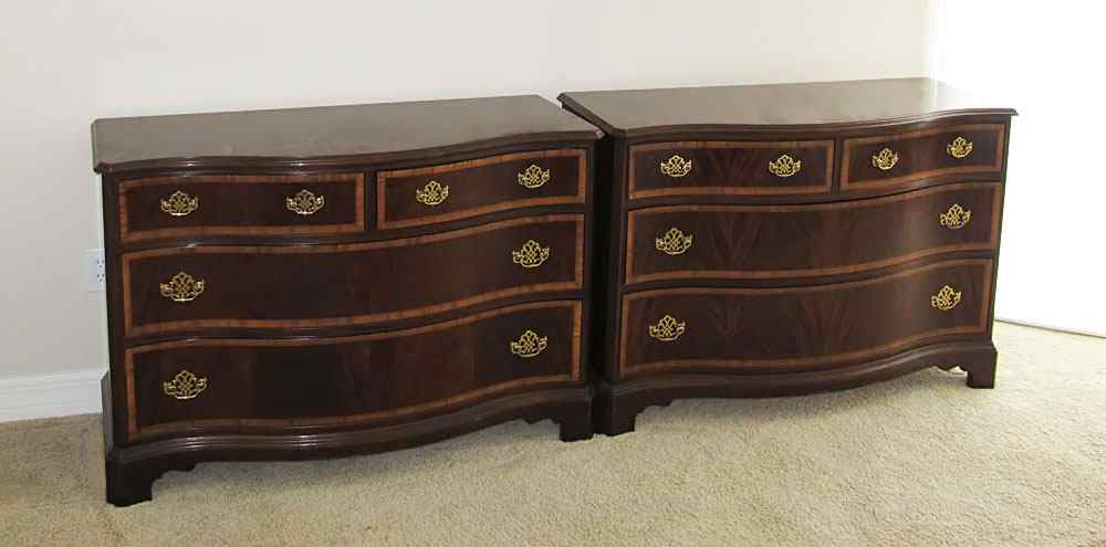 Appraisal: PAIR HICKORY AMERICAN MASTERPIECE DRESSERS Chippendale style serpentine front banded