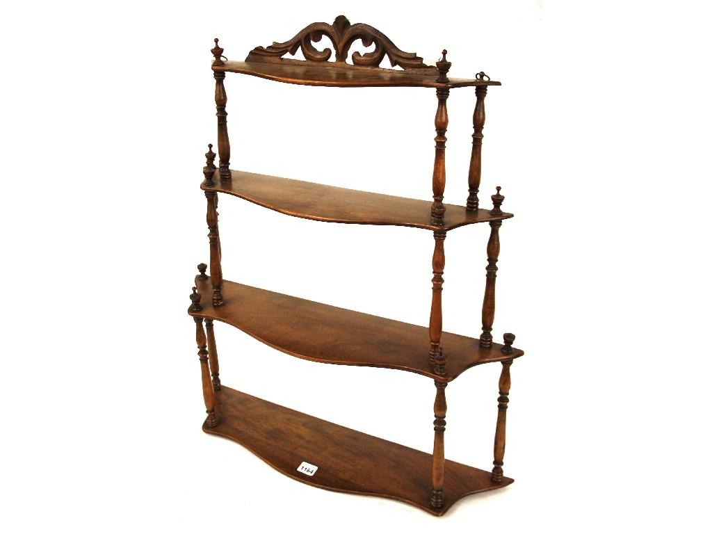 Appraisal: Set of graduated four tier wall shelves with pierced carved