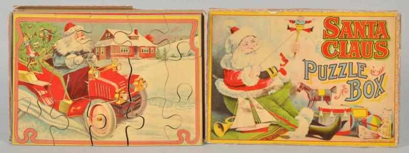 Appraisal: Milton Bradley Santa Claus Puzzles in Box Includes three complete