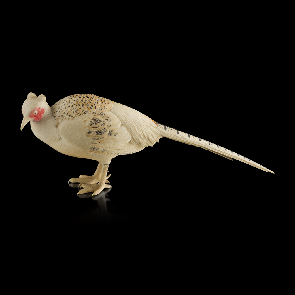 Appraisal: YPARTIALLY STAINED IVORY OKIMONO OF A PHEASANT SIGNED MITSUYUKI MEIJI