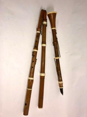 Appraisal: A boxwood clarinet stamped Whitaker London and two boxwood flutes