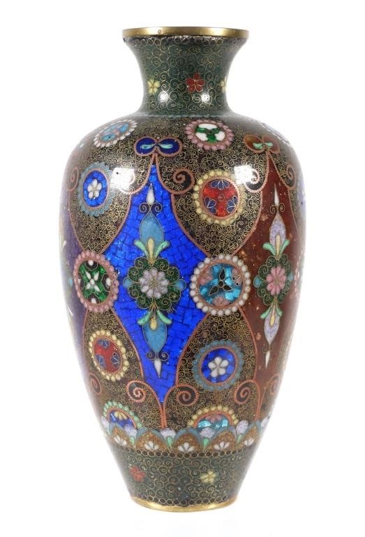 Appraisal: Japanese ornately decorated enamel vase with floral and geometric patterns