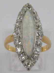 Appraisal: A yellow metal tests ct gold marquise shape opal and