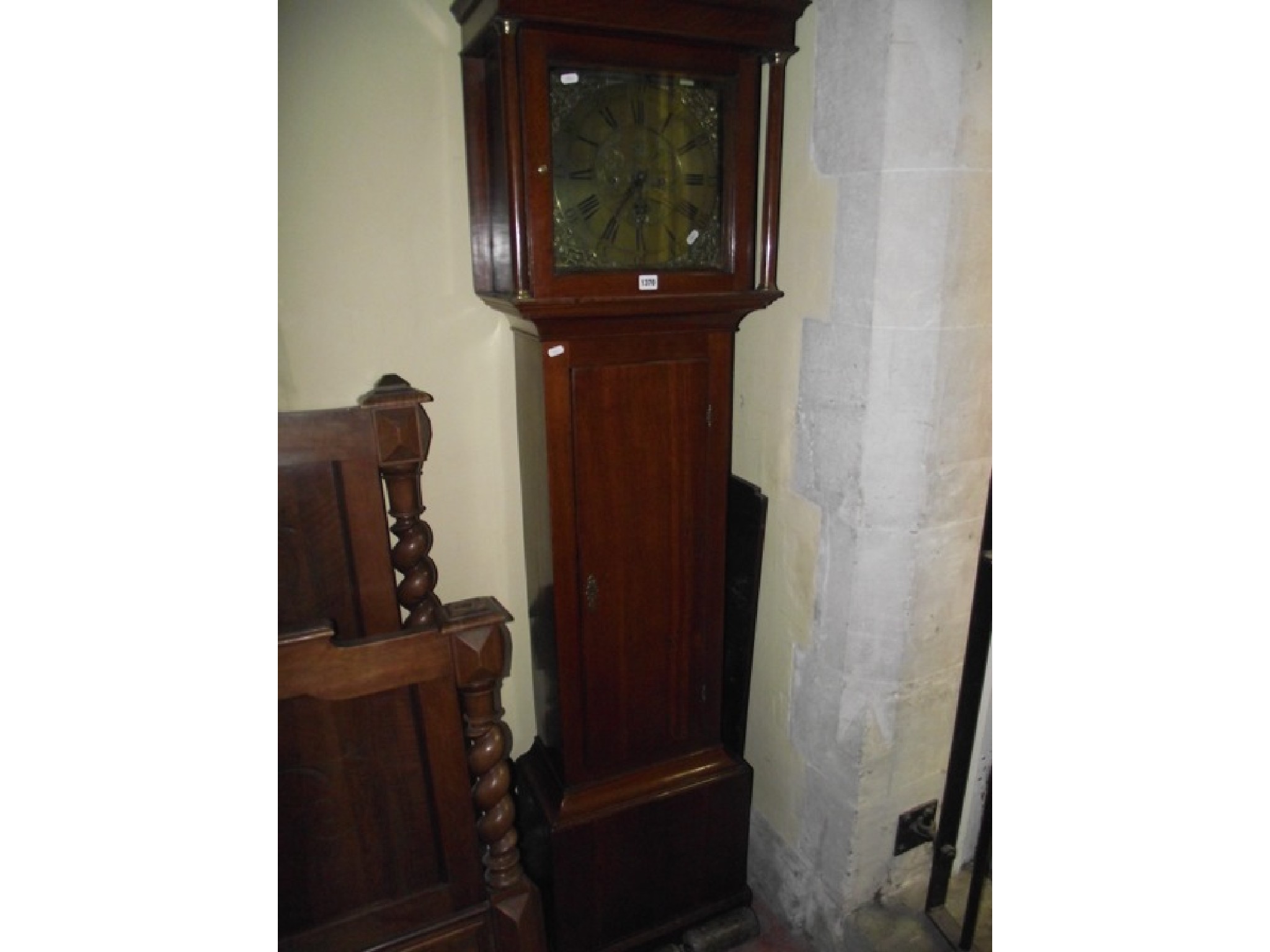 Appraisal: A Georgian country made oak longcase clock the hood with