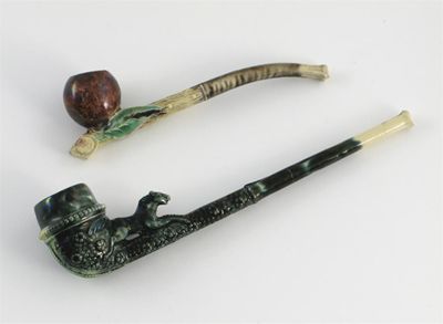 Appraisal: Two Whieldon-type pipes the longer with a pony cantering towards