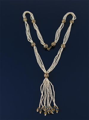 Appraisal: An Indian seed pearl Sautoir style necklace the four rows