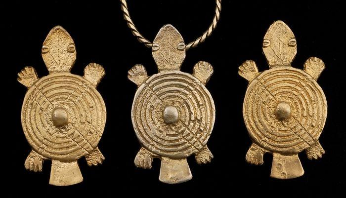 Appraisal: THREE TURTLE PENDANTS stamped k stamped Provenance Property from the