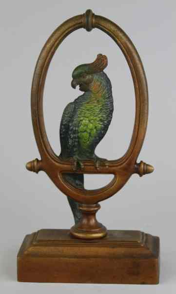 Appraisal: LARGE PARROT IN RING DOORSTOP Bradley Hubbard finely detailed casting