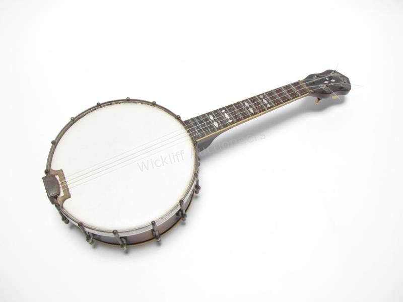 Appraisal: An antique Gibson UB- ukulele banjo head peghead with The