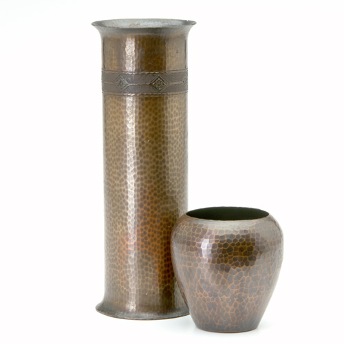 Appraisal: ROYCROFT Two hammered copper vases one tall cylindrical with hammered