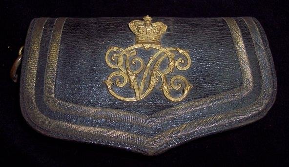 Appraisal: A Victorian officer's cartouche pouch circa monogrammed VR cm wide