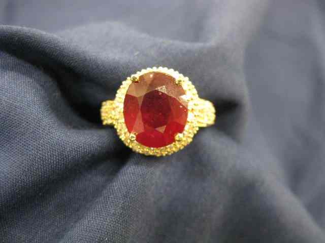 Appraisal: Ruby Diamond Ring carat oval gem surrounded by diamonds totaling