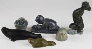 Appraisal: Inuit soapstone carvings of seals hunters walrus hts to Inuit