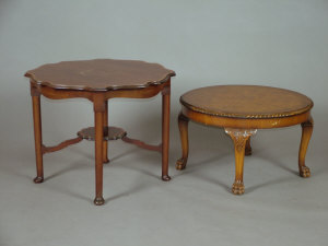 Appraisal: An Edwardian mahogany and inlaid occasional table with shaped top