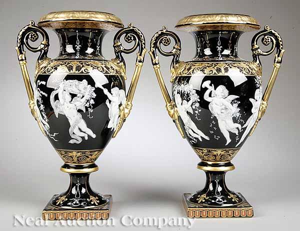 Appraisal: A Pair of Gilt and Enameled Porcelain Campagna Urns th