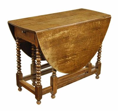 Appraisal: An oak gateleg table in Charles II style having an