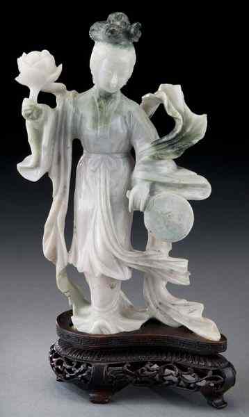 Appraisal: Chinese carved jadeite lady one hand holding a lotus the