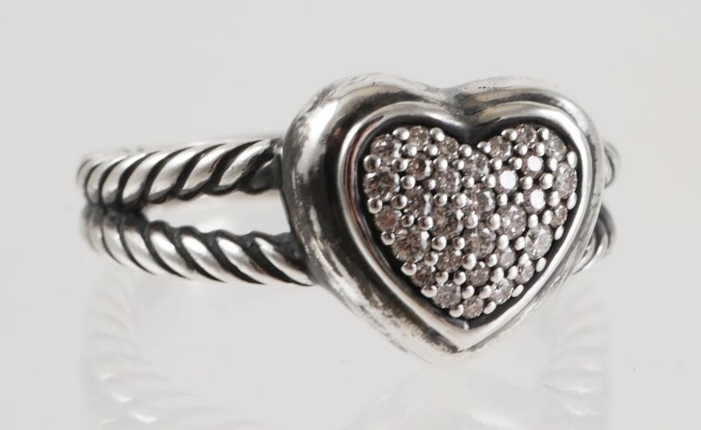 Appraisal: Delicate heart design with dramatic pave' set diamonds in sterling