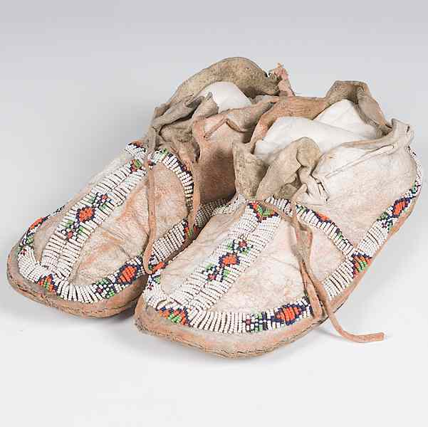 Appraisal: Northern Plains Beaded Hide Moccasins thread and sinew-sewn using bead