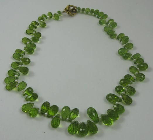 Appraisal: PERIDOT AND SEED PEARL NECKLACE in length and strung with