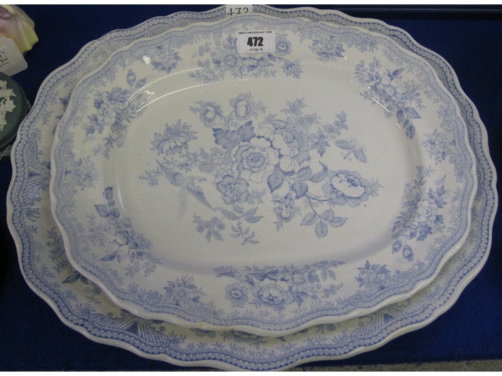 Appraisal: Two blue and white platters decorated with birds and foliage