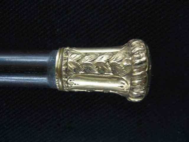 Appraisal: Victorian Gold-Filled Handled Walking Stick ebony ''