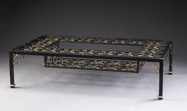 Appraisal: An Italian Baroque style parcel gilt ebonized iron low table