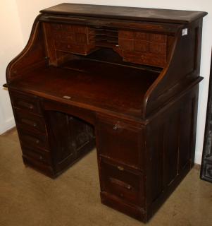 Appraisal: Victorian oak S- curve roll top desk width