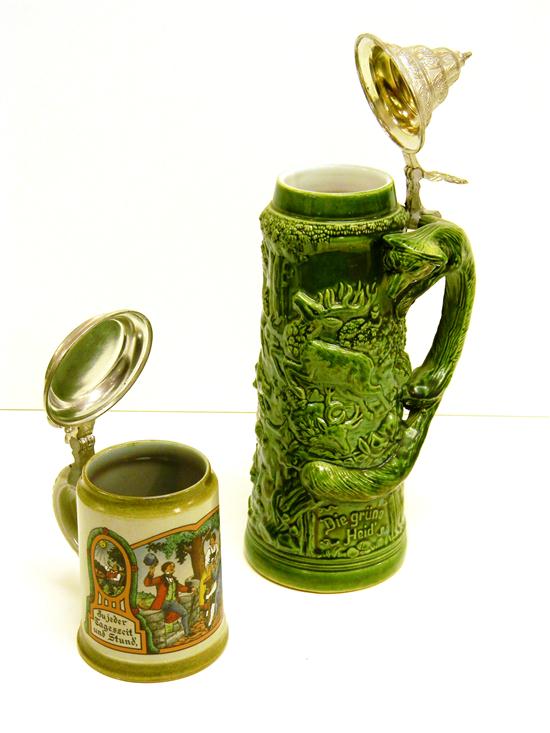 Appraisal: Grey-colored ceramic stein showing tryptych of drinking scenes solitary man