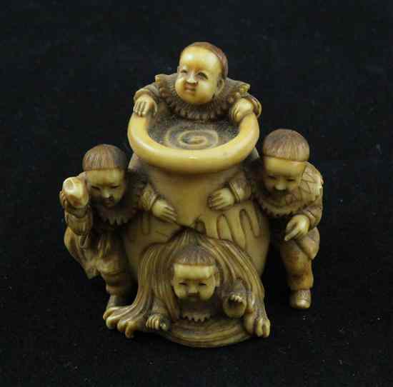 Appraisal: A stained ivory netsuke carved with Shiba Onko saving his