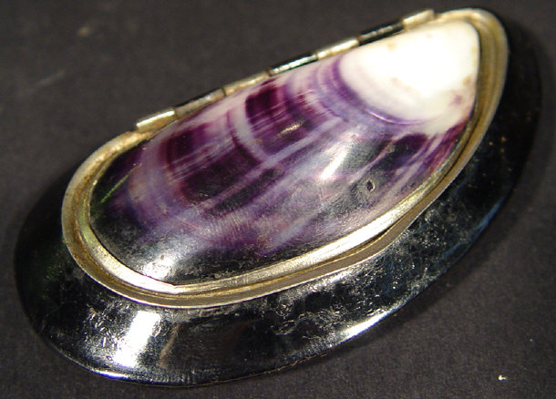 Appraisal: Victorian metal mussel shaped snuff box with shell lid cm