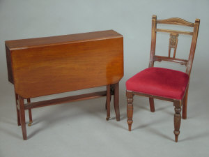 Appraisal: A set of six Edwardian walnut dining chairs with stuff