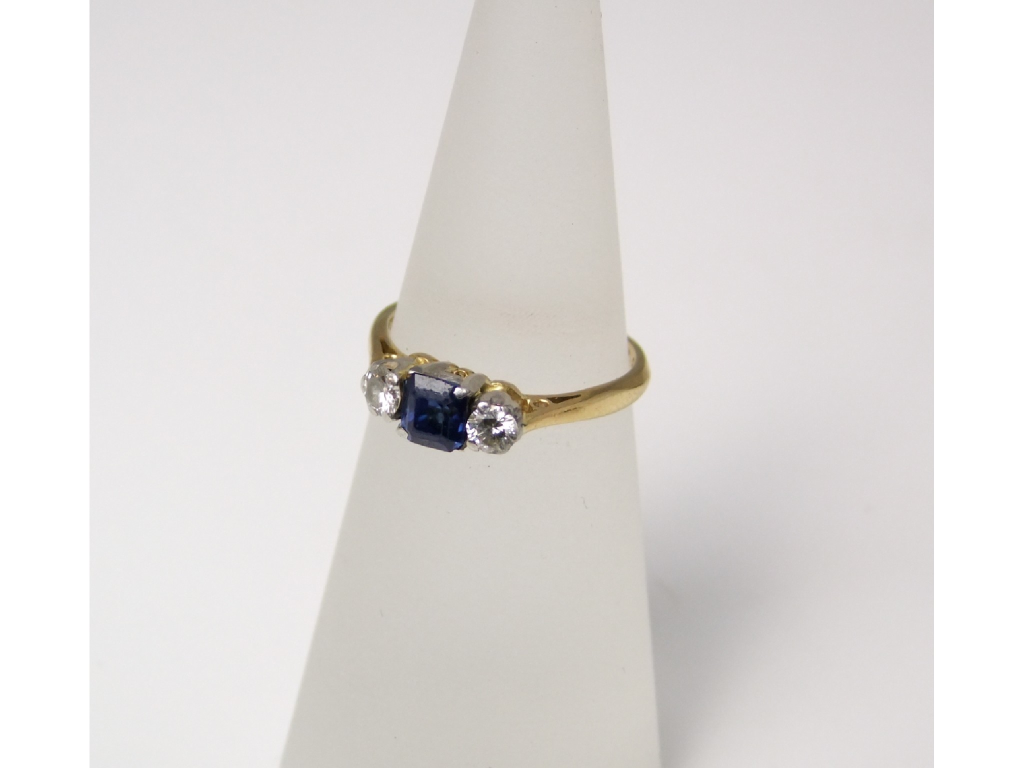 Appraisal: An ct gold three stone sapphire and diamond ring size