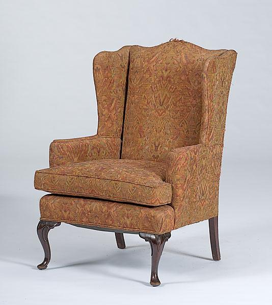 Appraisal: QUEEN ANN UPHOLSTERED ARMCHAIR th century Queen Ann upholstered armchair