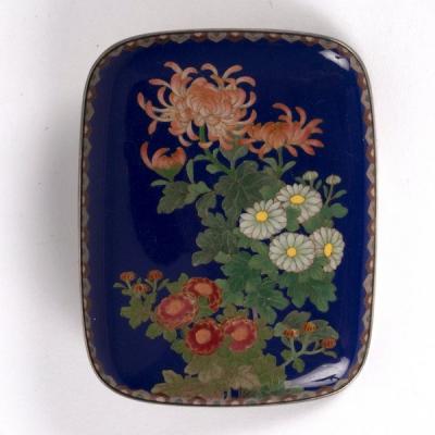 Appraisal: A Japanese cloisonn brooch of oblong form decorated flowers to