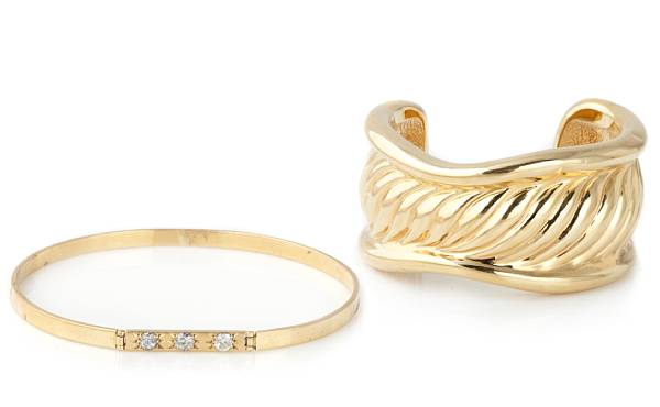 Appraisal: A k gold cuff bangle with a diamond and gold