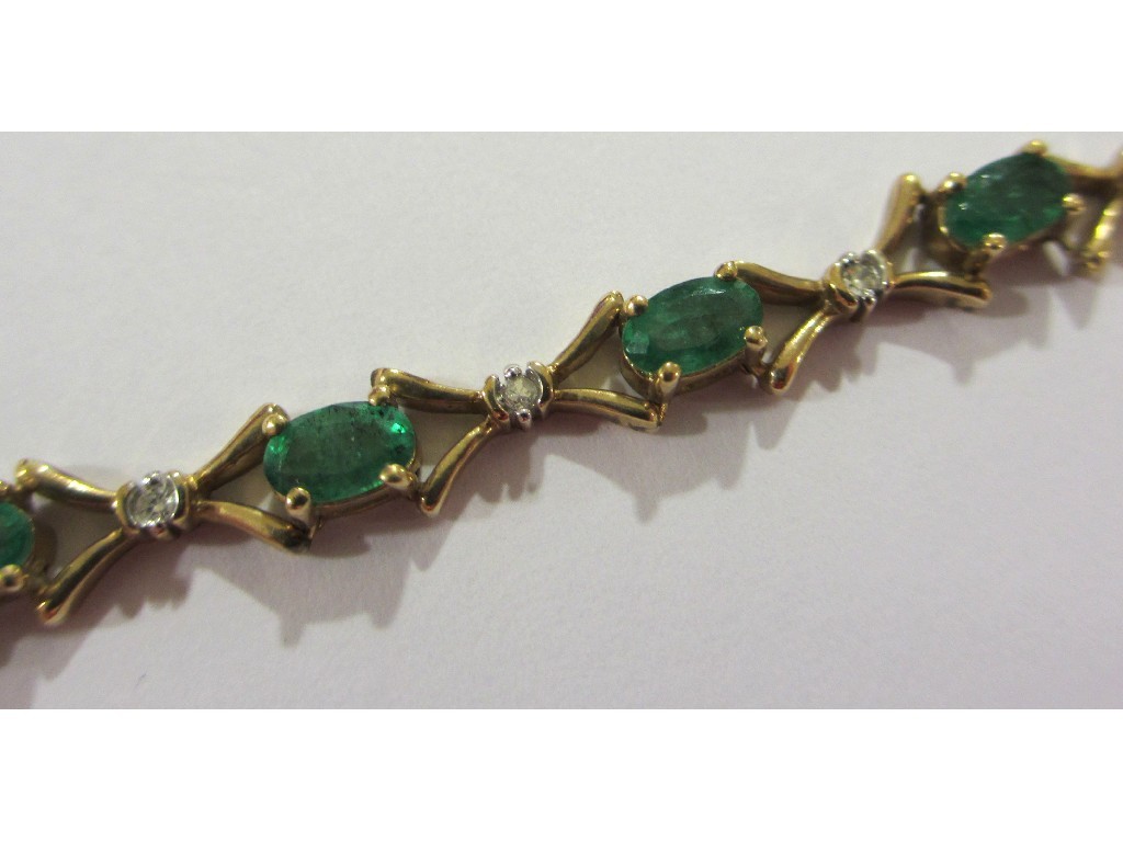 Appraisal: Nine carat gold emerald and diamond set bracelet