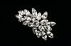 Appraisal: BROOCH - Platinum and white sapphire spray form brooch set