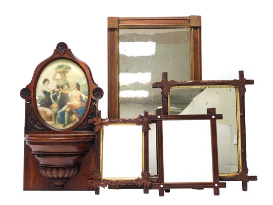 Appraisal: MIRROR Four wall mirrors with carved cross-bodied wooden frames and