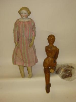 Appraisal: A bisque china shoulder head girl doll with painted face