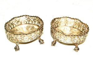 Appraisal: A pair of George III silver salts of pierced oval