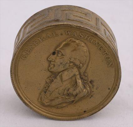 Appraisal: ENGLISH REPOUSS BRASS-LIDDED CIRCULAR BOX The lid with profile bust