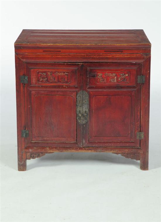 Appraisal: DIMINUTIVE CABINET Chinese late th-early th century softwood Two carved