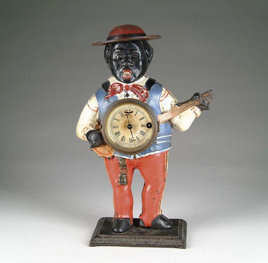 Appraisal: SAMBO W BANJO BLINKING EYE CLOCK The mate to the